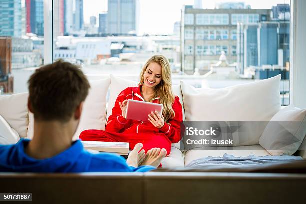 Young Couple In An Apartment Stock Photo - Download Image Now - 20-24 Years, Adult, Adults Only
