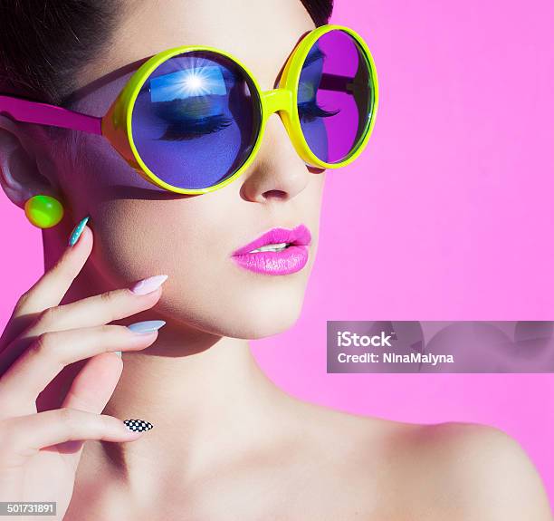 Portrait Of An Attractive Young Woman With Sunglasses Stock Photo - Download Image Now