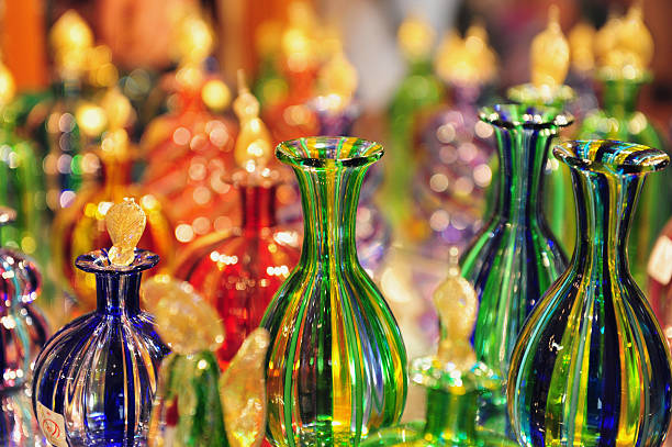 Glasswork on Murano Island, Italy Glass making transition in Murano island in the Venetian Lagoon, northern Italy. murano stock pictures, royalty-free photos & images