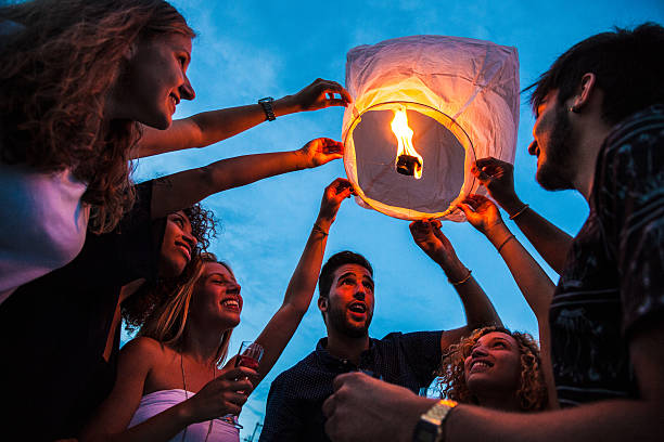 istock Lighting a paper lantern in the air 501738240