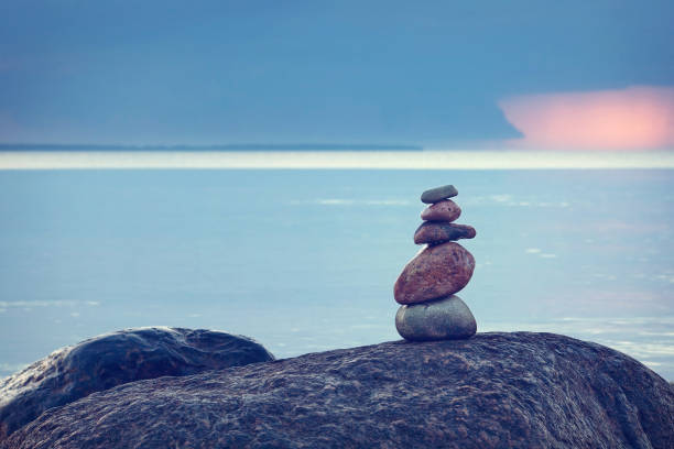 istock balanced stones at the sea 501738261