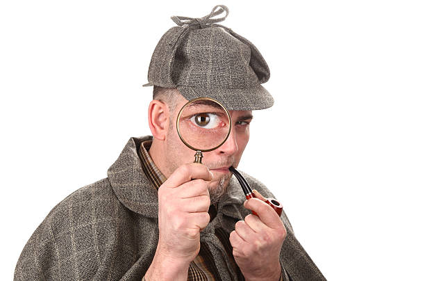 istock Detective investigate with magnifying glass big eye 501739146