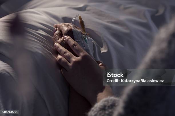 Woman Supporting Mother With Cancer Stock Photo - Download Image Now - Death, Bed - Furniture, Hospital