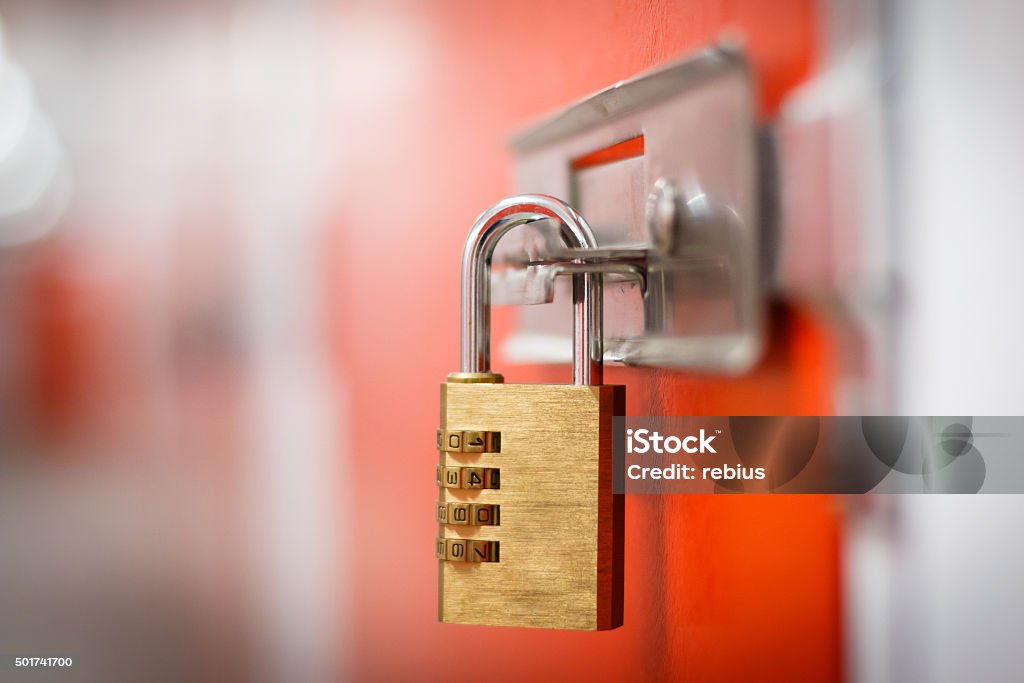 Padlock Gold padlock with code to secure storage Padlock Stock Photo