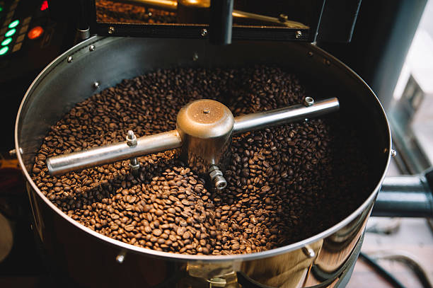 istock freshly roasted coffee beans n a coffee roaster 501745354