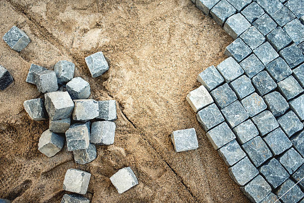 istock Pavement rocks, stones and cobblestone blocks, construction of path 501748372