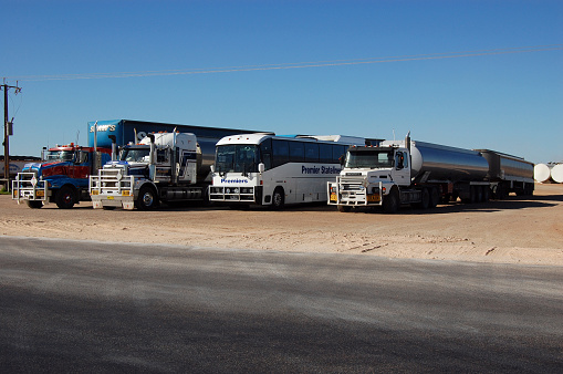 Trucks and road trains parking in Australian outback
