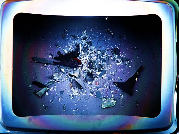 istock smashed television screen bright blue purple glass 501750282