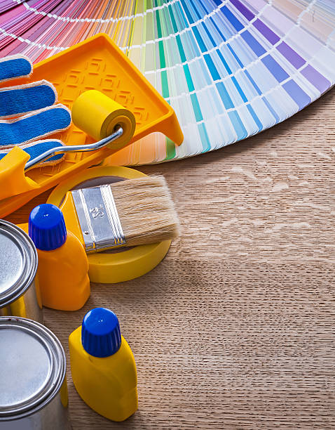 Set of painting tools on wood board construction concept