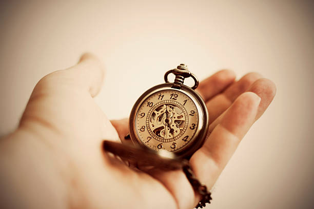 istock Male hand holding stopwatch 501751360