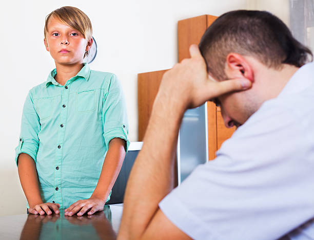 istock Father and teenage son argue 501753086