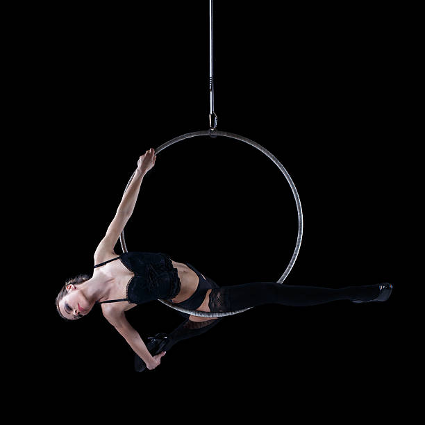istock Aerial dancer hanging on hoop isolated 501762636