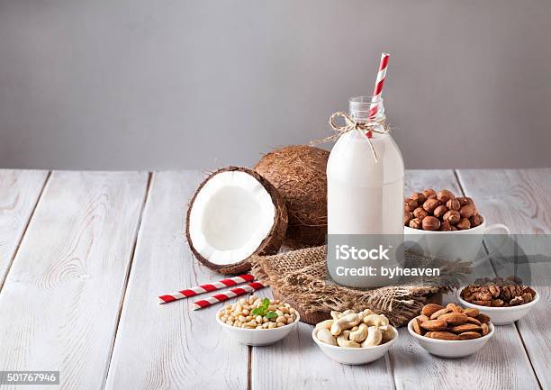 Vegan Nut Milk In The Bottle Stock Photo - Download Image Now - Vegetable, Milk, Drink