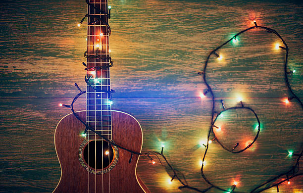 Christmas Decoration ukulele on the wooden table with christmas decoration with  Christmas Ornament acoustic music photos stock pictures, royalty-free photos & images