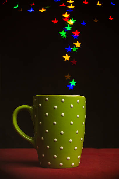 istock star shape bokeh lights floating out of a mug 501769034