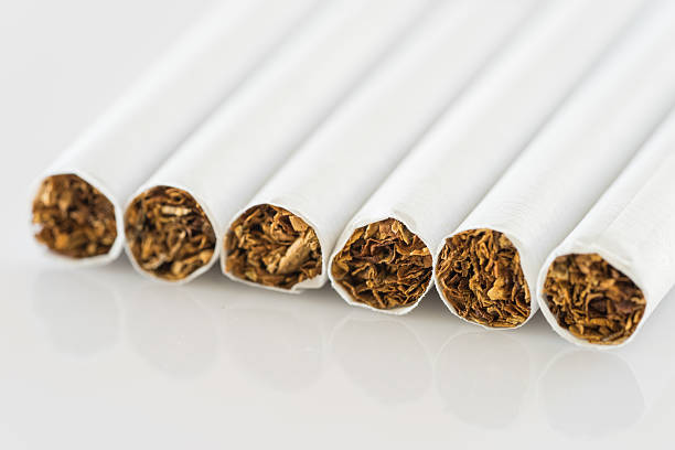 istock close up set of cigarettes on white background 501769136