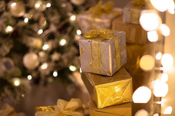 istock gold and silver Christmas gifts under the Christmas tree, 501770578