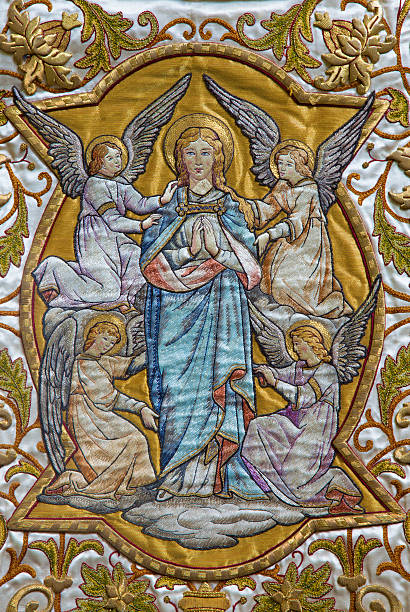 istock Mechelen - Needelwork of Virgin Mary on flag in Janskerk. 501774413