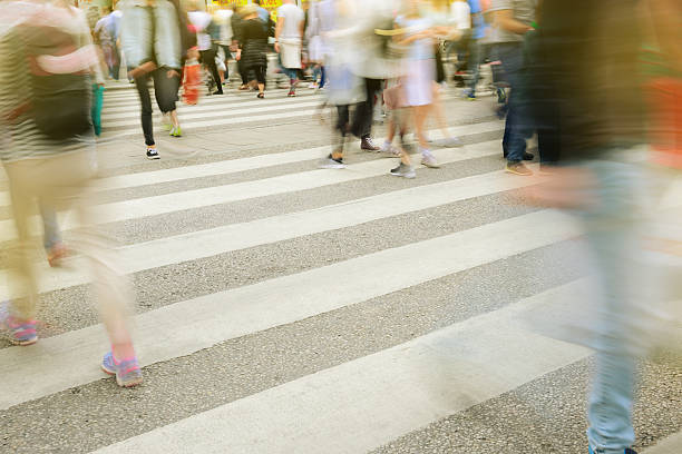 istock Young people crossing street, motion blur 501774728