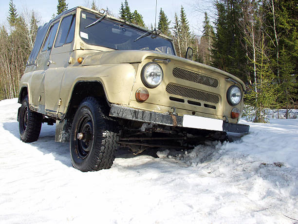 istock Russian off-road vehicle fell into a deep snow 501774733
