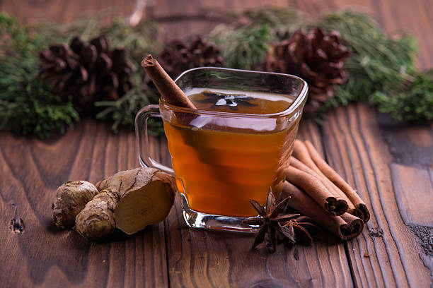 Warm drink for winter: tea, cinnamon, star anise, and ginger