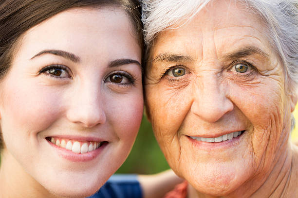 istock Young woman and grandmother smiling 501777585