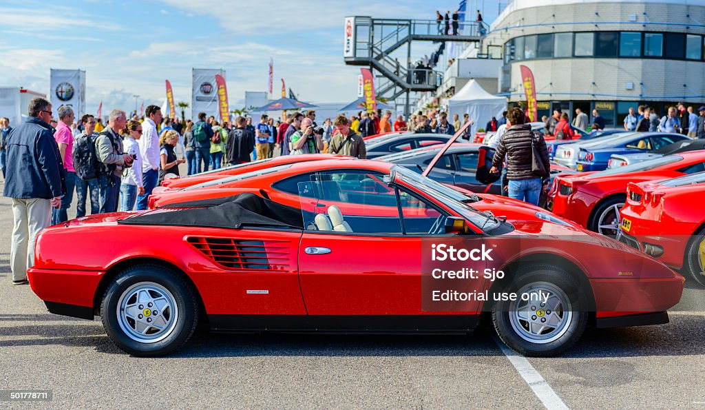 Ferrari Mondial Cabriolet 3.2 sports car Zandvoort, The Netherlands - June 29, 2014: Ferrari Mondial 8 Convertible in the paddock at the Zandvoort race track during the 2014 Italia a Zandvoort day. People in the background are looking at the cars. Motor Racing Track Stock Photo
