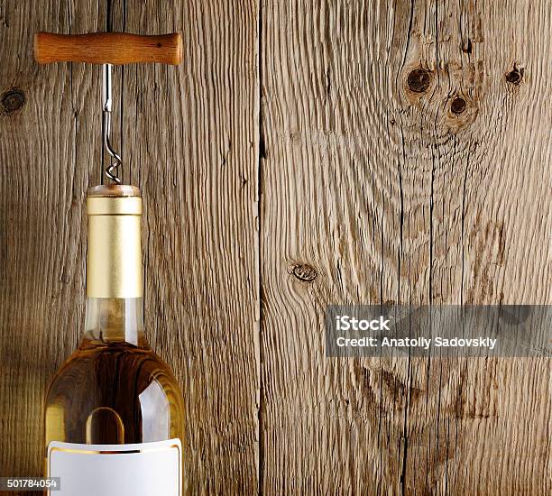 Wine Bottle On Old Wood Stock Photo - Download Image Now - 2015, Alcohol - Drink, Bottle