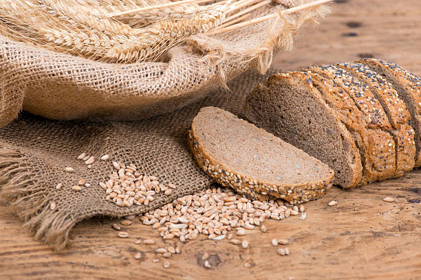 istock Rustic bread on an old vintage wooden table 501784304