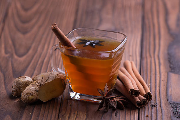 istock Warm drink for winter: tea, cinnamon, star anise, and ginger 501785870