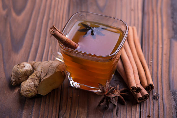 istock Warm drink for winter: tea, cinnamon, star anise, and ginger 501785978
