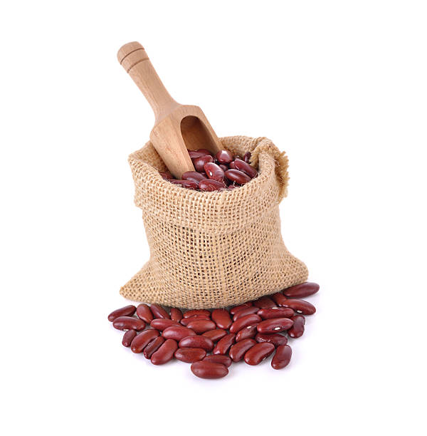 istock dried red bean in sack on white background 501786472