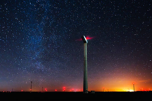 istock Milky Way and stars over the wind turbine 501789032
