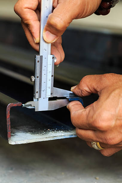 istock dimension measuring steel lipped channel by vernier 501789666