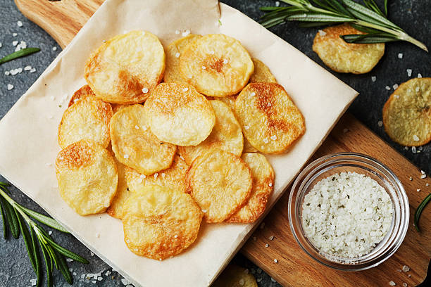 istock Junk food from potato chips and sea salt, top view 501792862