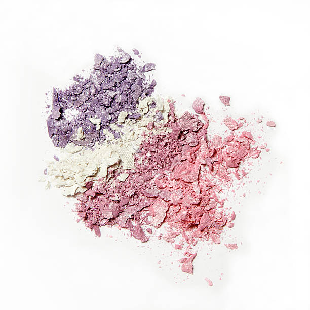istock purple pink and white crumbled eyeshadow on white background 501793318