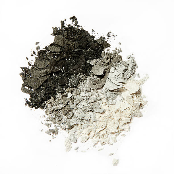 istock black grey silver and white crumbled eyeshadow on white background 501793440