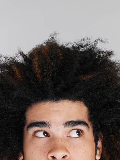 istock Man With Afro Hairdo Looking Sideways 501794403
