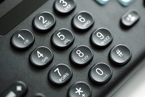 Dialing telephone keypad concept for communication, contact us and customer service support