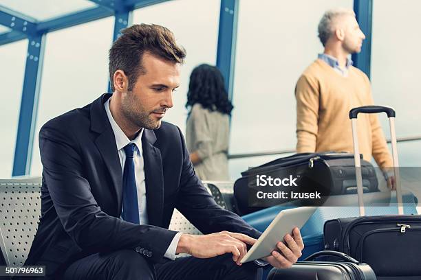 Businessman Waiting For Flight Stock Photo - Download Image Now - 30-39 Years, Adult, Adults Only