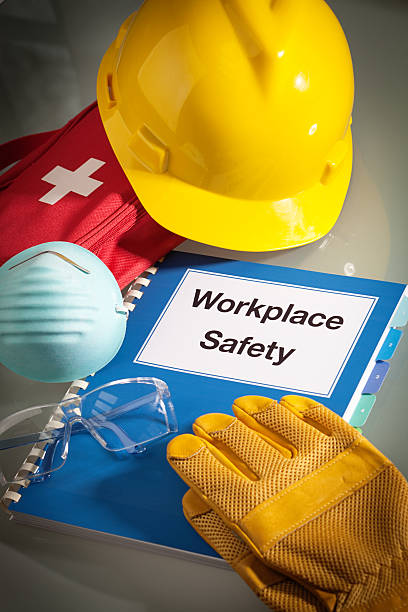 istock Workplace Safety Handbook Manual and Equipment Vertical Close-up 501797993