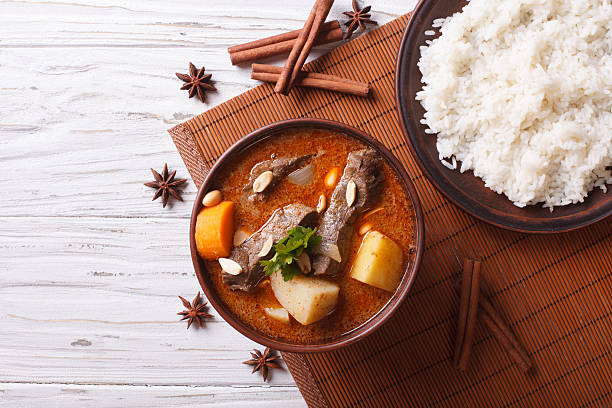 istock Thai beef massaman curry and rice dish. horizontal top view 501798574