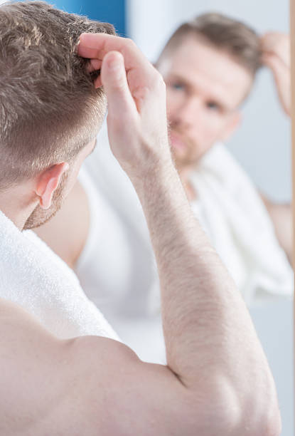 istock Narcissistic man in the bathroom 501799250