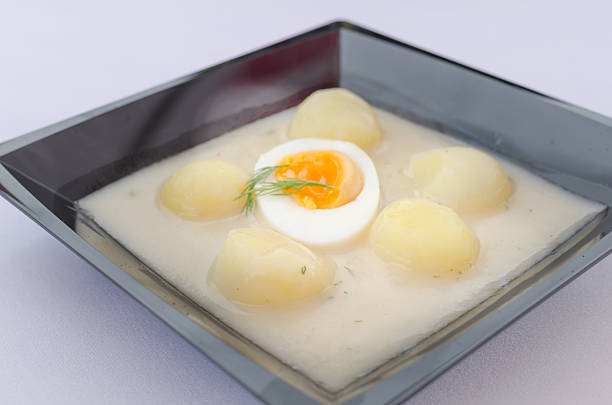 istock Creamy dill sauce with boiled egg and chateau potatoes. 501800635