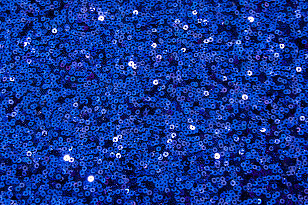 Glittering Blue Sequins Pattern Texture and Background stock photo