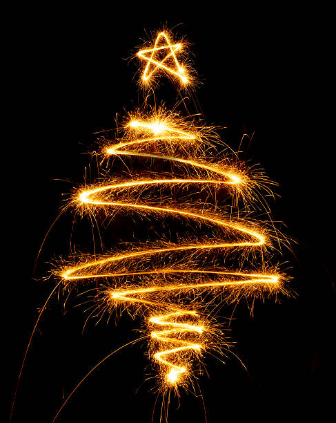 istock Christmas tree made with sparkler on a black 501812886
