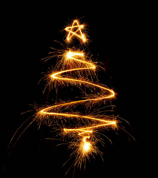 istock Christmas tree made with sparkler on a black 501813122