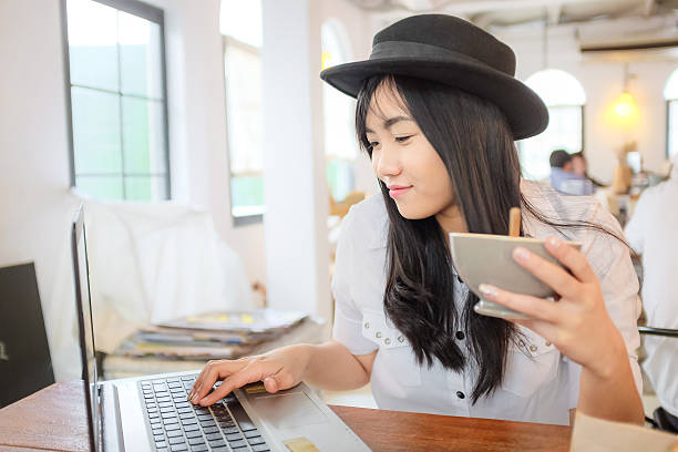 istock Young smart female student use laptop computer 501813230