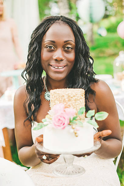 istock Beautiful woman with beautiful cake 501813699
