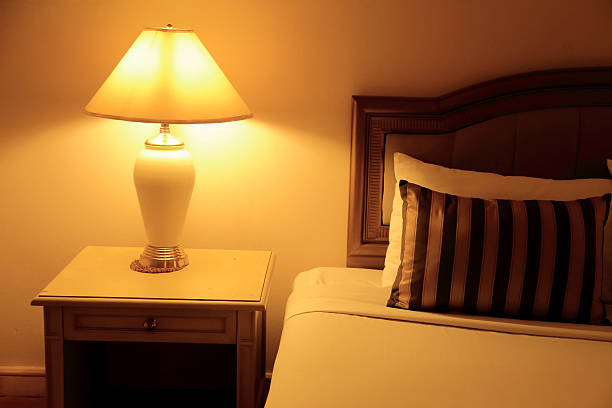 istock Night scene image of hotel room interior, comfortable bed. 501813756